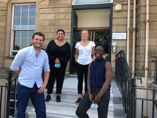 A group standing outside Blythswood square